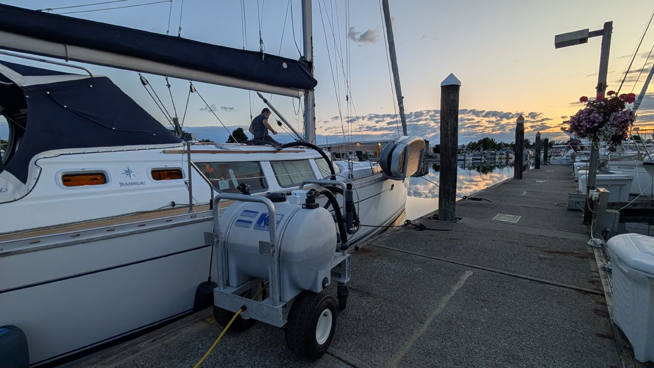Pumping out the holding tank at the Bellingham marina dock at sunset