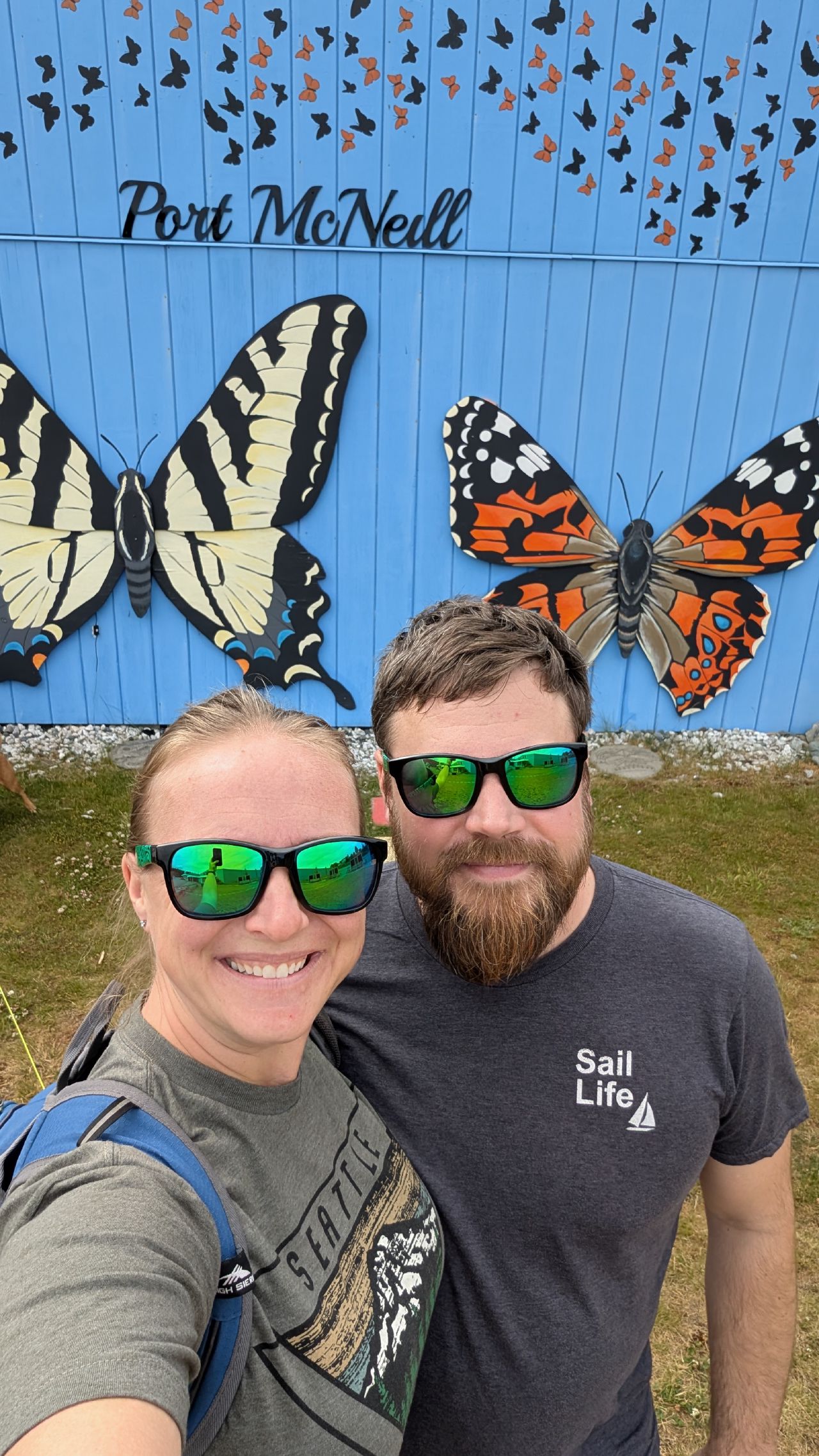 Rachel and Brian selfie in front of the Port McNeill butterfly mural