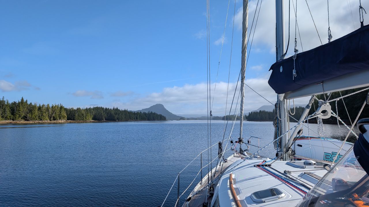 Calm protected waters after turning into Reid Passage with forested islands ahead