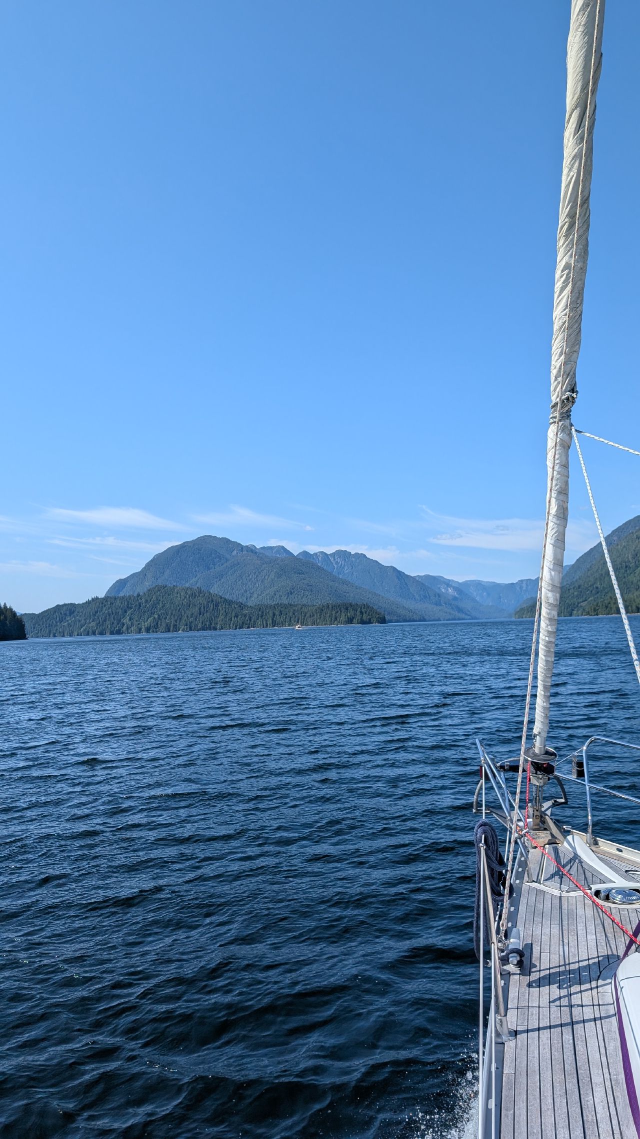 View from the bow of SV Yahara approaching Princess Royal Island on a beautiful clear day