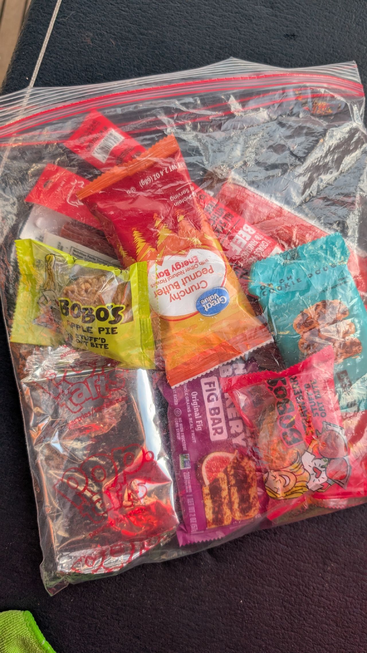 A ziplock bag full of snack bars and treats packed for the long Cape Caution passage