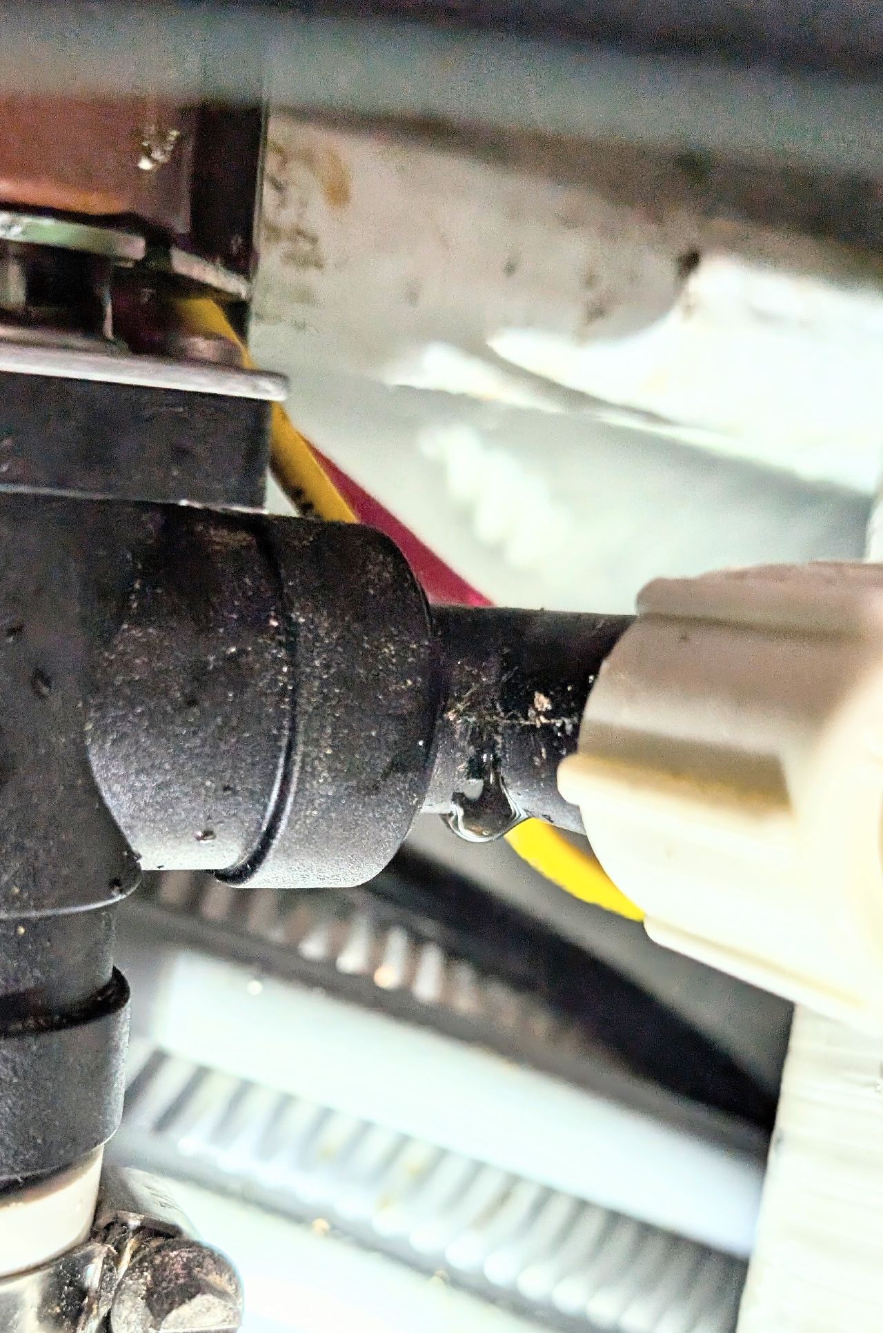 Close-up of the leaking plumbing fitting in the forward head that was the source of the water leak