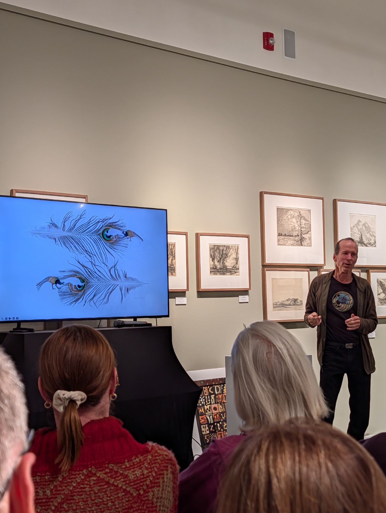 An artist giving a gallery talk at the museum