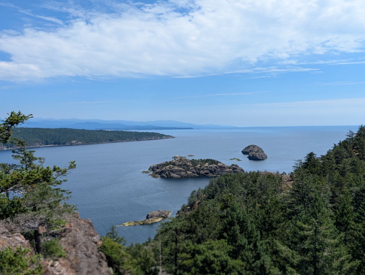 Sweeping view of islands and blue water from the Jedediah Island hike