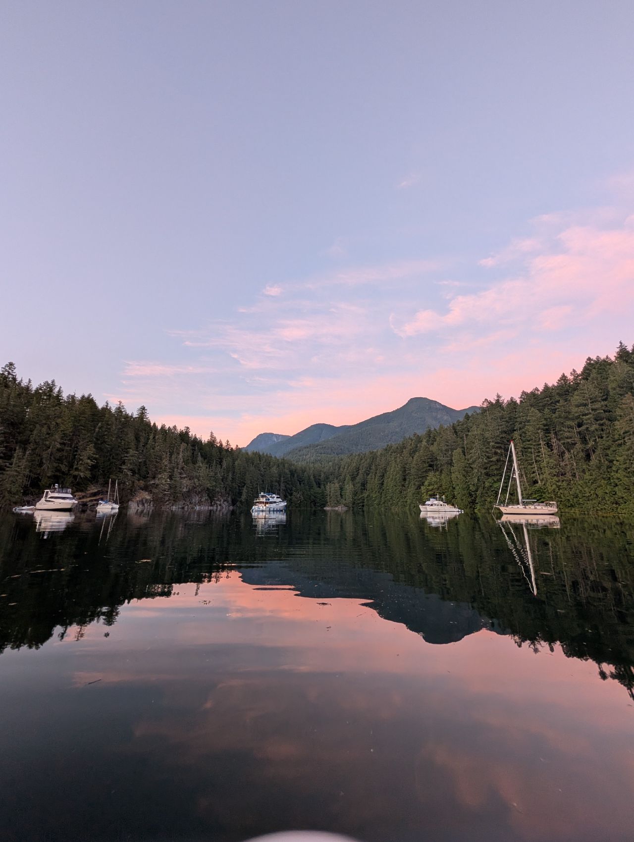 Pastel sunset over the calm Melanie Cove anchorage