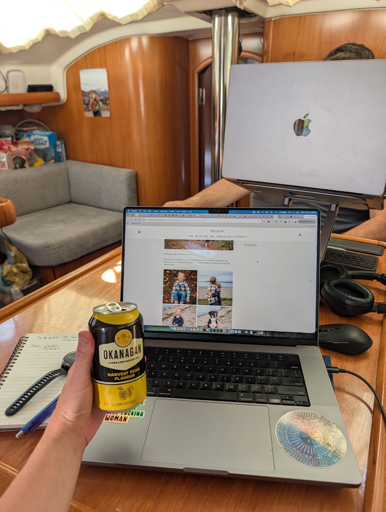 Writing the blog on a laptop at the boat’s salon table